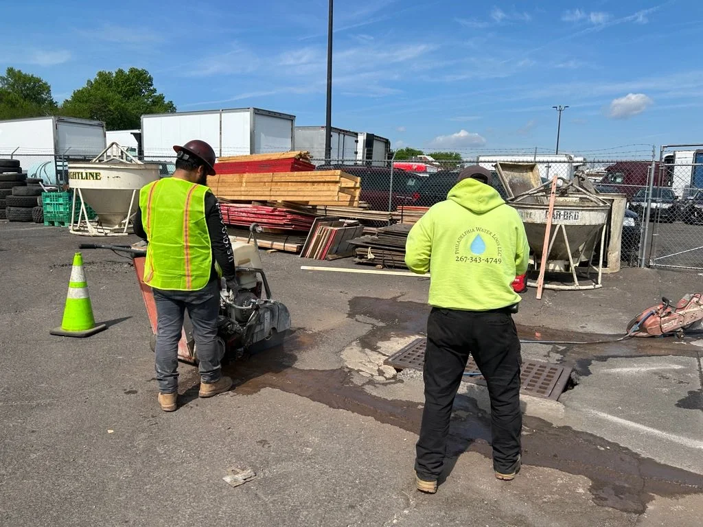 2 workers ready to do a sinkhole repair