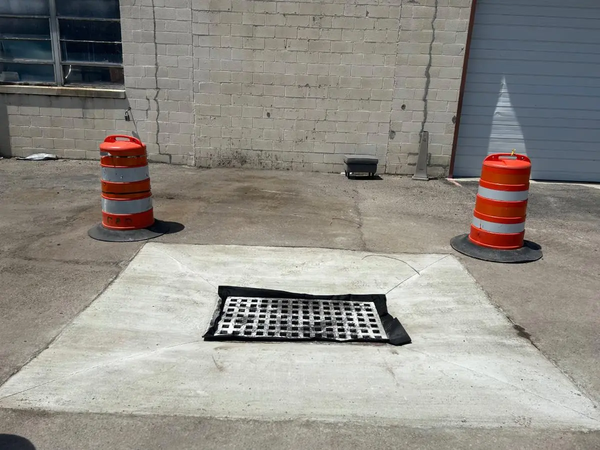 basin repair with traffic cones