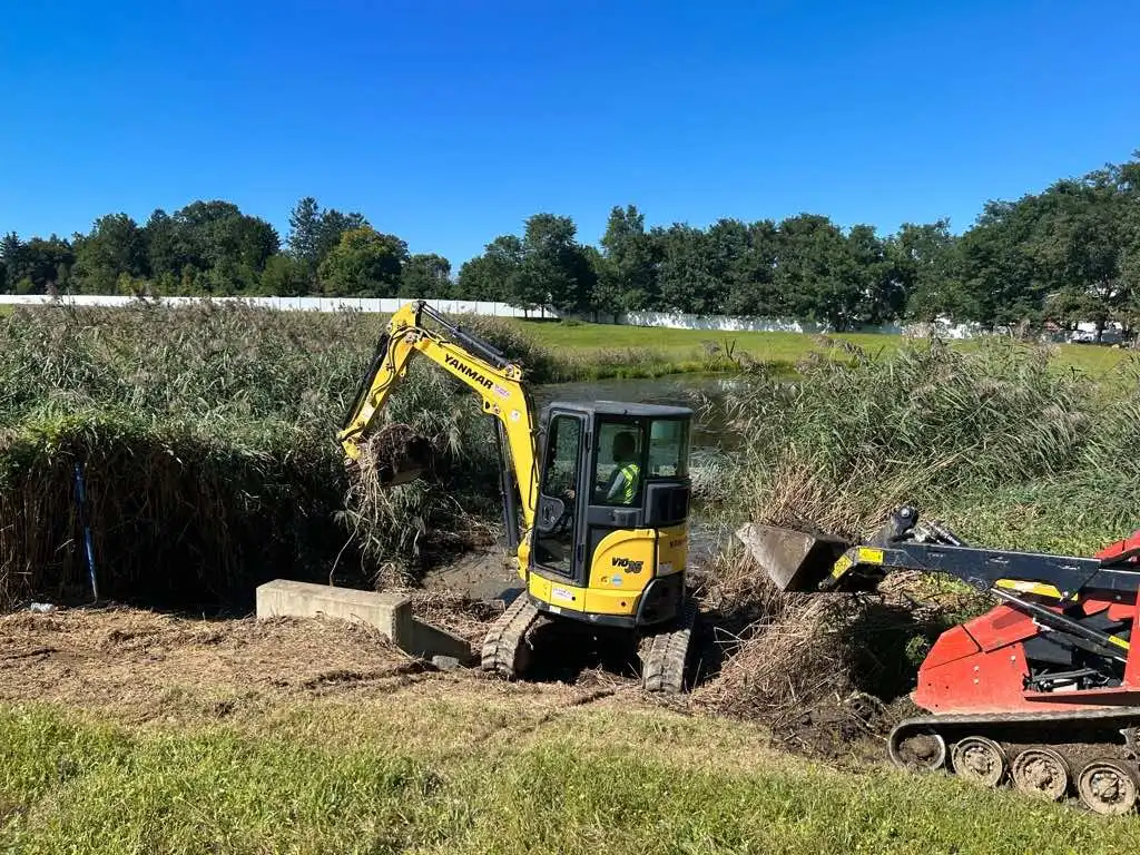 dredging basin in pond